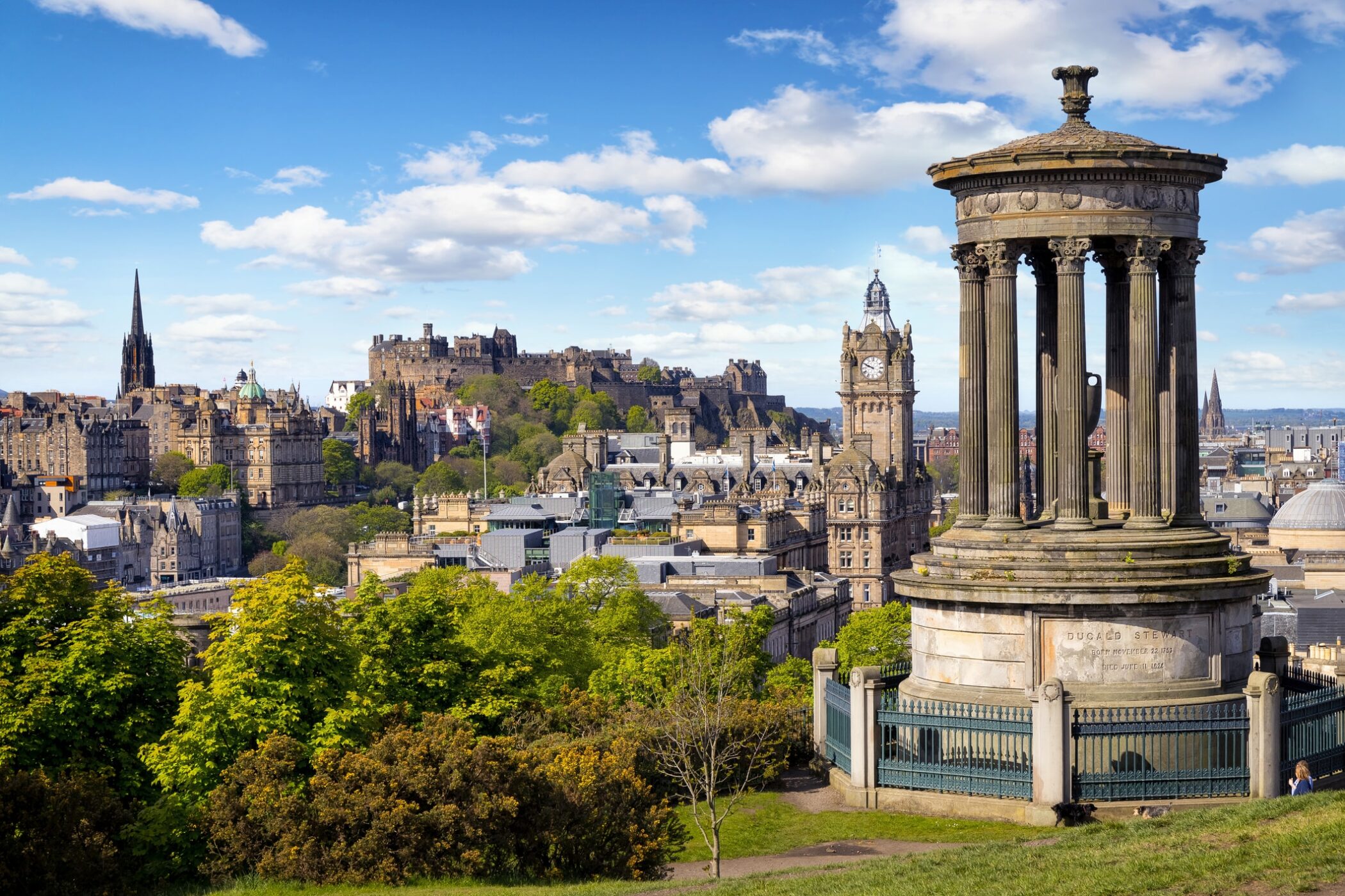 Dugald Stewart Monument and view over historic Edinburgh from Calton Hill, Scotland, UK