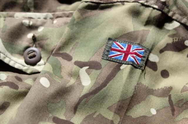 Union Jack flag on the British military camouflage uniform